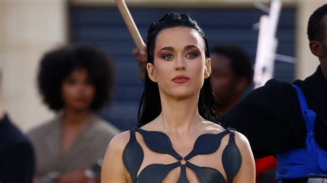 Katy Perry goes topless in black fur coat at Paris Fashion Week